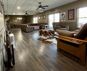 a living room with two dogs laying on a rug at Lake Oconee Waterfront Apartment in Greensboro