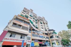 a tall apartment building with colorful windows at Townhouse Tulip in Vadodara