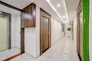 a hallway with a door in a building at Townhouse Tulip in Vadodara