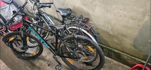 a group of bikes parked next to a wall at Apartmani Marin in Vukovar