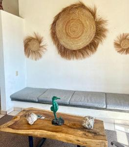 a living room with a couch and a table at Incredible 360 views 5 min from downtown in Tepoztlán