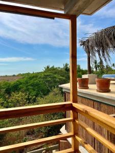 a view from the deck of a house at Casa Chukum - Retreat House - Agua Blanca in Playa Agua Blanca