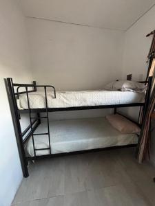 a room with two bunk beds in a room at Casa Susana in Jesús María +1 photo