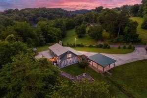an aerial view of a house in the woods at Hillside Haven in Kodak