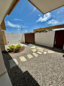 a house with a patio with a view of the desert at Pipa Sunset Mansion in Pipa