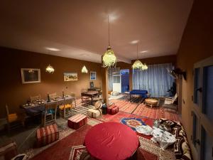 an overhead view of a living room with a red umbrella at Dar Talhaya in Oulad Driss