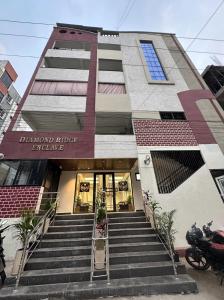 a building with stairs in front of a building at Diamond Ridge Living 1RK G-02 in Haidar Sāhibgūda