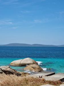 a large rock in the middle of the ocean at Lakeside view in Cuthbert