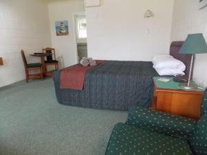 Postel nebo postele na pokoji v ubytování Rangiora Lodge Motel
