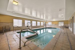 a large swimming pool in a hotel room at Holiday Inn Express Hotel & Suites Limon I-70/Exit 359 by IHG in Limon