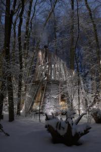 a house in the woods in the snow at Namety Park in Kyiv