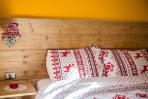 Postelja oz. postelje v sobi nastanitve Albergo Rotenthal