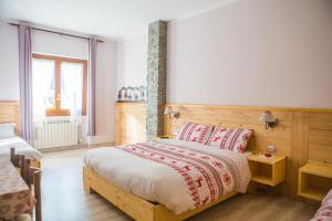 Postelja oz. postelje v sobi nastanitve Albergo Rotenthal
