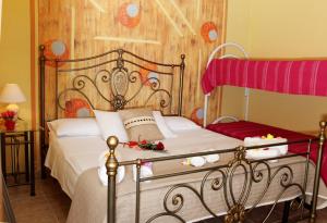 Ein Bett oder Betten in einem Zimmer der Unterkunft Tenuta Paifer