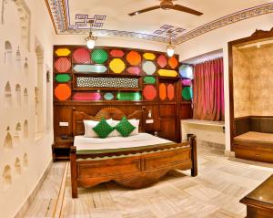 Hotel Pearl Palace Jaipur房間的床