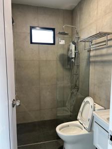 a bathroom with a shower and a toilet at The Forest Pool villa & cafe in Ban Wang Yao +13 photos