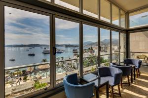 a view of the water from a room with windows at Diamond Of Bodrum in Bodrum City