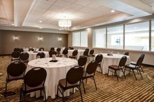 a conference room with round tables and chairs at Holiday Inn Lancaster by IHG in Lancaster +80 photos