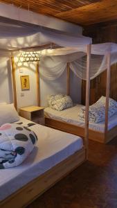 a bedroom with two bunk beds at Kabila moja hostel in Iringa