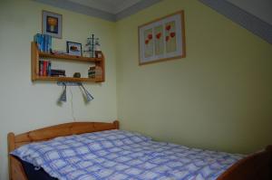 Ένα ή περισσότερα κρεβάτια σε δωμάτιο στο Apartment Holunderbusch