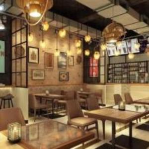 a restaurant with tables and chairs in a room at Hotel Maple Tree , Gomtinagar Extension , Lucknow in Lucknow +27 photos