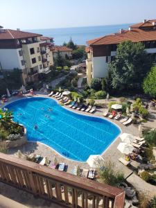 a view of a swimming pool in a resort at Garden of Eden- MintGarden- Sveti Vlas in Sveti Vlas