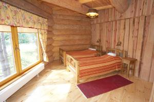 Rúm í herbergi á Greete Motel