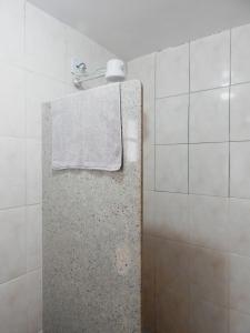 a towel is on a towel rack in a bathroom at Casa de Mariazinha in Ouro Preto +29 photos
