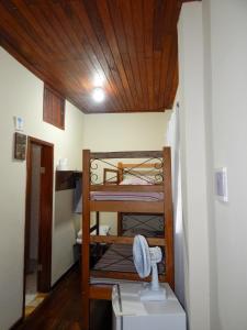 a small room with a bunk bed in a house at Casa de Mariazinha in Ouro Preto