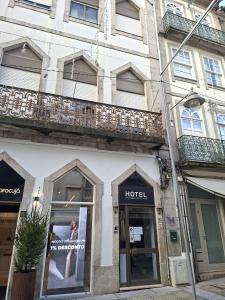 a hotel on the side of a building with a balcony at Porta 80 House in Braga +46 photos