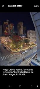 a picture of a city at night with street lights at QUARTO PRIVADO COM INTERNETE PRÓXIMO A UFGS in Porto Alegre