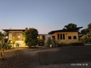 a house with a driveway in front of it at nature in Ban Rong Koet +11 photos