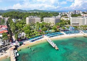 an aerial view of a beach with buildings and a city at Özkaymak Incekum Resort - Ultra All Inclusive in Avsallar