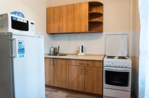 Kuhinja oz. manjša kuhinja v nastanitvi Apartments in Kirov Orlovskaya 4