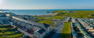 an aerial view of a city with the ocean at Luxury 2-Bedroom Apartment Overlooking the Beach in Bundoran