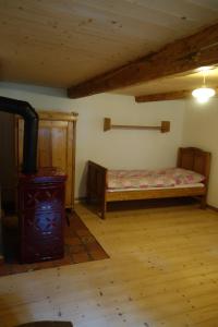 Postel nebo postele na pokoji v ubytování MausHaus