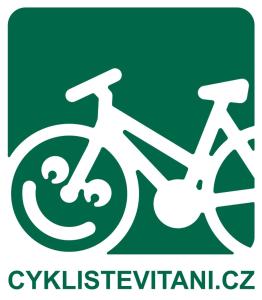 a white bike logo on a green background at Camp Litomerice in Litoměřice