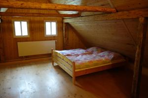 Postel nebo postele na pokoji v ubytování MausHaus