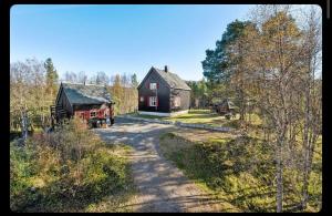an aerial view of a house and a road at Valhalla Hytte in Oppdal