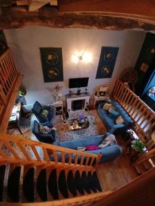 an overhead view of a living room with a couch at La Belle Maison in Piégut-Pluviers