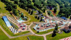 an aerial view of a water park with a amusement park at Moonlight Mountain Lodge on Camelback Mountain! in Tannersville