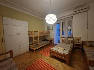 a living room with a couch and a table at HostelChe Hostel in Belgrade