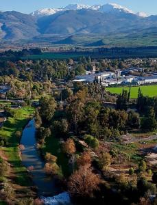an aerial view of a river with mountains in the background at בית יפה-casa Bella in Qiryat Shemona