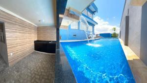 a bathroom with a swimming pool in a house at Pousada coração da serra in Serra de São Bento