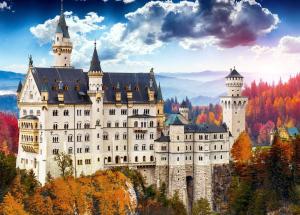 a castle on top of a mountain with trees at Gemütliche Wohnung in Baldham bei München in Vaterstetten