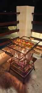 a basket of food sitting on a table at The Jungle Gate Villa in Udaipur