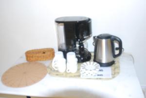 a coffee maker sitting on top of a counter at Accueil Porte-Dunoise in Orléans