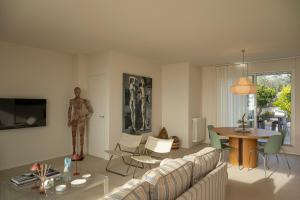 a living room with a couch and a table at CasaCeciliamare in Ortona