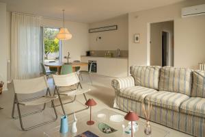 a living room with a couch and a table at CasaCeciliamare in Ortona