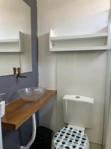 a bathroom with a sink and a toilet at Pousada Valverde Suíte 2 in Rio de Janeiro